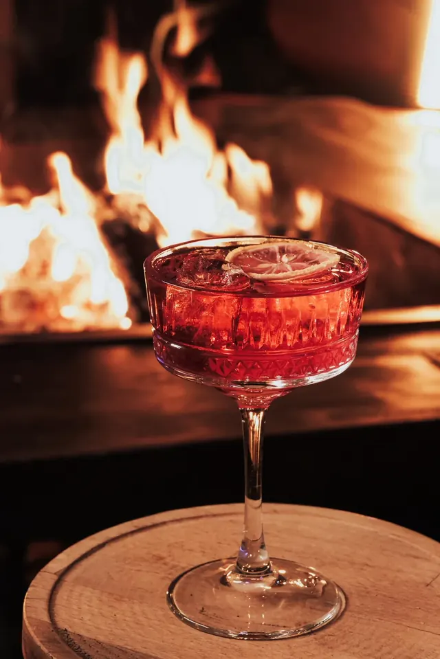 A cocktail by the fire